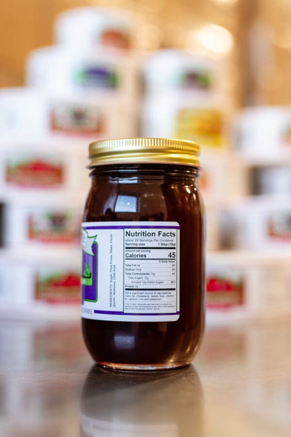 A jar of honey with the label on it.