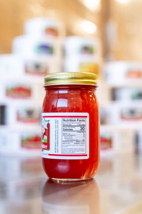 A jar of tomato sauce on the table