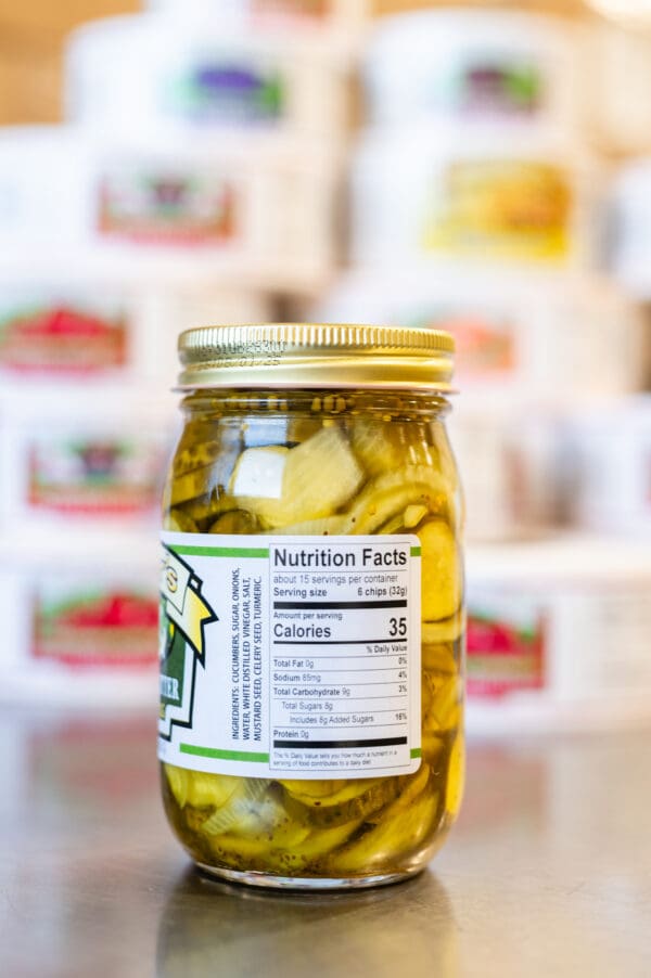 A jar of pickles with a nutrition label on it.