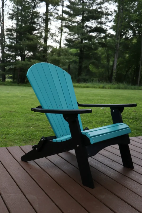 A blue chair on the deck of a house