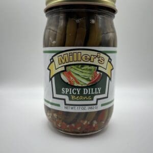 A jar of pickles sitting on top of a table.